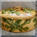 K08. Covered baking dish with leaf decorations. 
